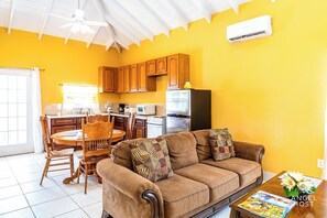 Apartment, 2 Bedrooms | Living area | TV - Chalk Sound Beach Residences (Providenciales)