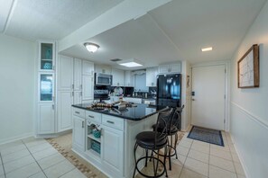 Fridge, microwave, oven, stovetop - D1 Amelia South Fabulous First Floor Oceanfront Condo, Fabulous First Floor Oceanfront Condo (Fernandina Beach)