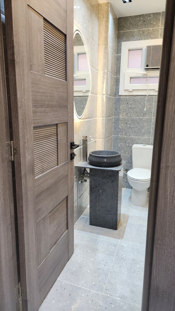 Shower, towels, soap, toilet paper