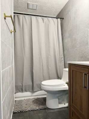 Hair dryer, towels, soap, toilet paper