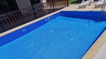 Outdoor pool, sun loungers
