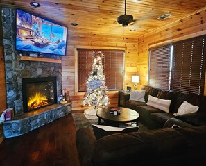 Smart TV, fireplace, foosball, books