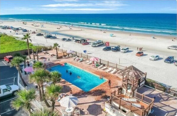 On the beach, sun loungers, beach towels