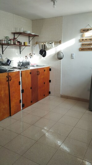 Fridge, stovetop, coffee/tea maker, electric kettle