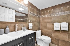 Shower, hair dryer, shampoo