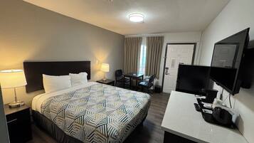 Tabla de planchar con plancha, wifi gratis y ropa de cama