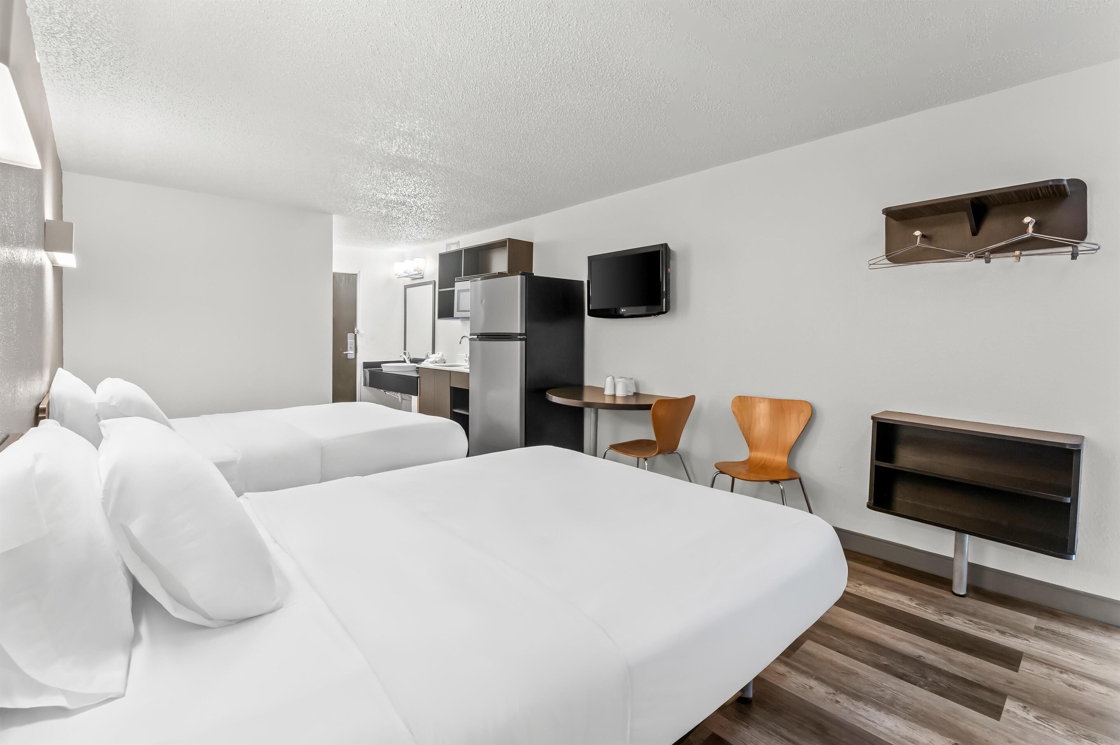 Standard Room, 2 Queen Beds, Non Smoking, Kitchenette | Free WiFi, bed sheets