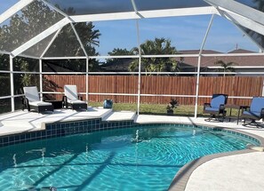 A heated pool - Charming Coastal Vibe, 3BR Home with Heated Pool (Cape Coral)