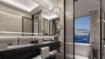 Separate tub and shower, rainfall showerhead, free toiletries