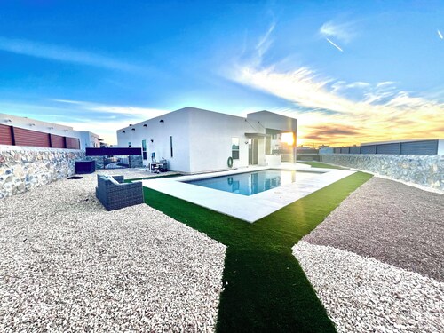 Modern Mountainside Pool House with Sunset Views on West Side