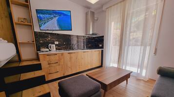 Family Condo | Living area | TV
