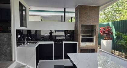 Spacious 2 bedroom beach house with AC WIFI BBQ Terrace and car port