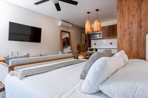 1 bedroom, desk, iron/ironing board, travel crib