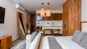 1 bedroom, desk, iron/ironing board, travel crib