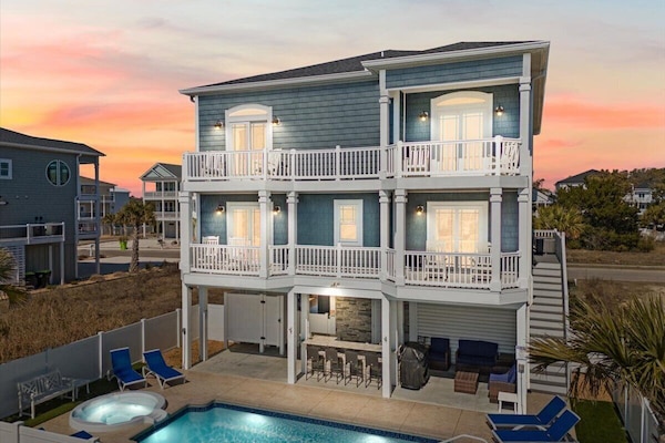 Beautiful, modern beach house with hot tub, heated pool, and tiki bar awaits!