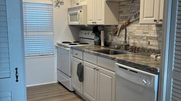 Coffee/tea maker, fridge, microwave, oven