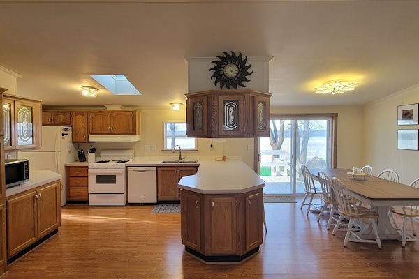 Kitchen and dining area with views of the bay.