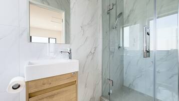 Shower, hair dryer, towels, soap