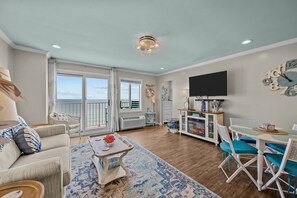 TV, fireplace - Oceanfront 2bd 2bth / Fish/ Pool /Fitness Ctr/ 1406 (Virginia Beach)