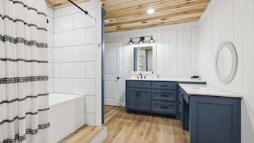 Shower, hair dryer, towels, shampoo