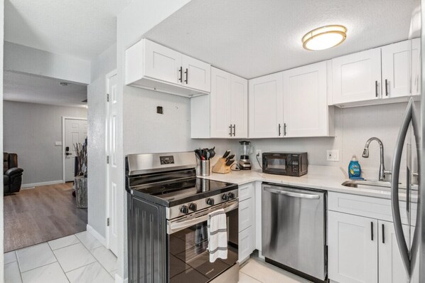 Fridge, microwave, oven, stovetop