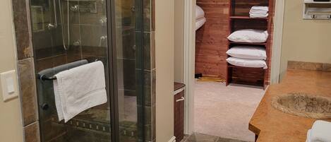Shower, jetted tub, towels, soap