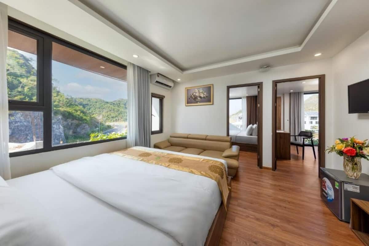 Deluxe Room, Garden View | 3 bedrooms, desk, laptop workspace, free WiFi