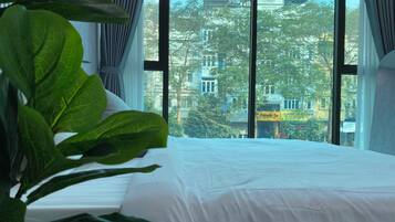 Desk, laptop workspace, free WiFi, bed sheets