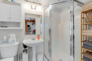 Hair dryer, towels, soap, shampoo