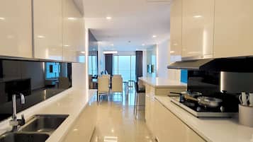 Apartment, 2 Bedrooms | Living area | 40-inch TV with cable channels