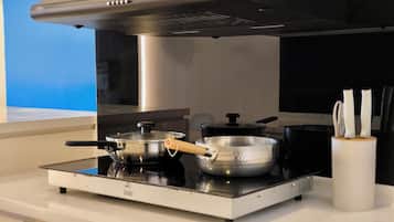 Apartment, 2 Bedrooms | Living area | 40-inch TV with cable channels