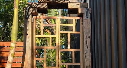 Tathra Tides | Walk to Beach & Shops | Private Sauna | Tropical Gardens