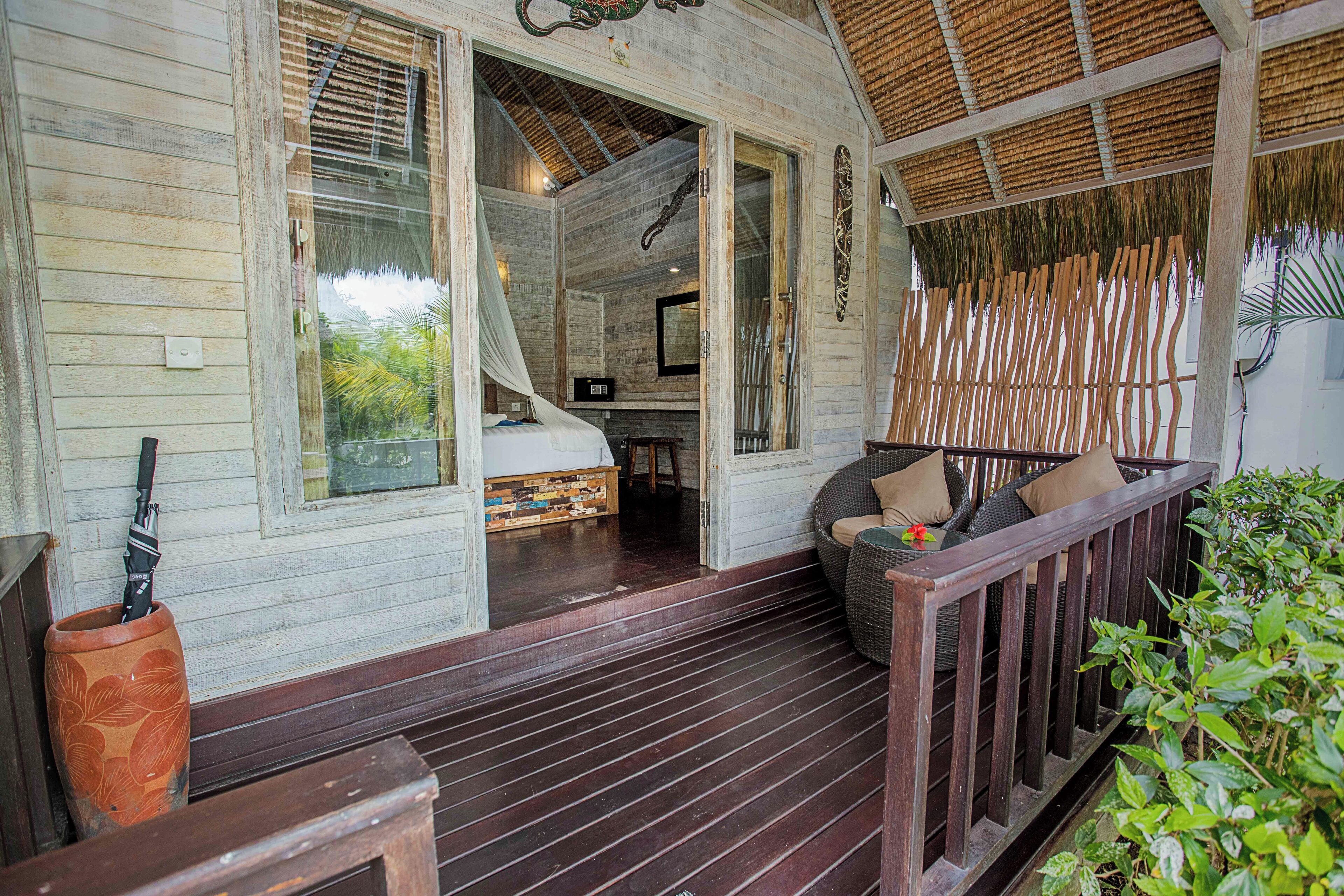 Deluxe Bungalow, Garden View | Terrace/patio