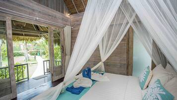 Bungalow Deluks, pemandangan kebun | Ruang kerja ramah laptop, Wi-Fi gratis, dan seprai linen