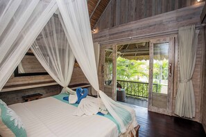 Deluxe Bungalow, Garden View | Bathroom | Shower, rainfall showerhead, hair dryer, towels