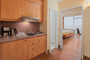 Comfort Apartment, 1 Bedroom | Private kitchen | Fridge, microwave, coffee/tea maker, toaster