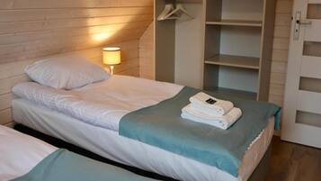 12 bedrooms, individually furnished, bed sheets