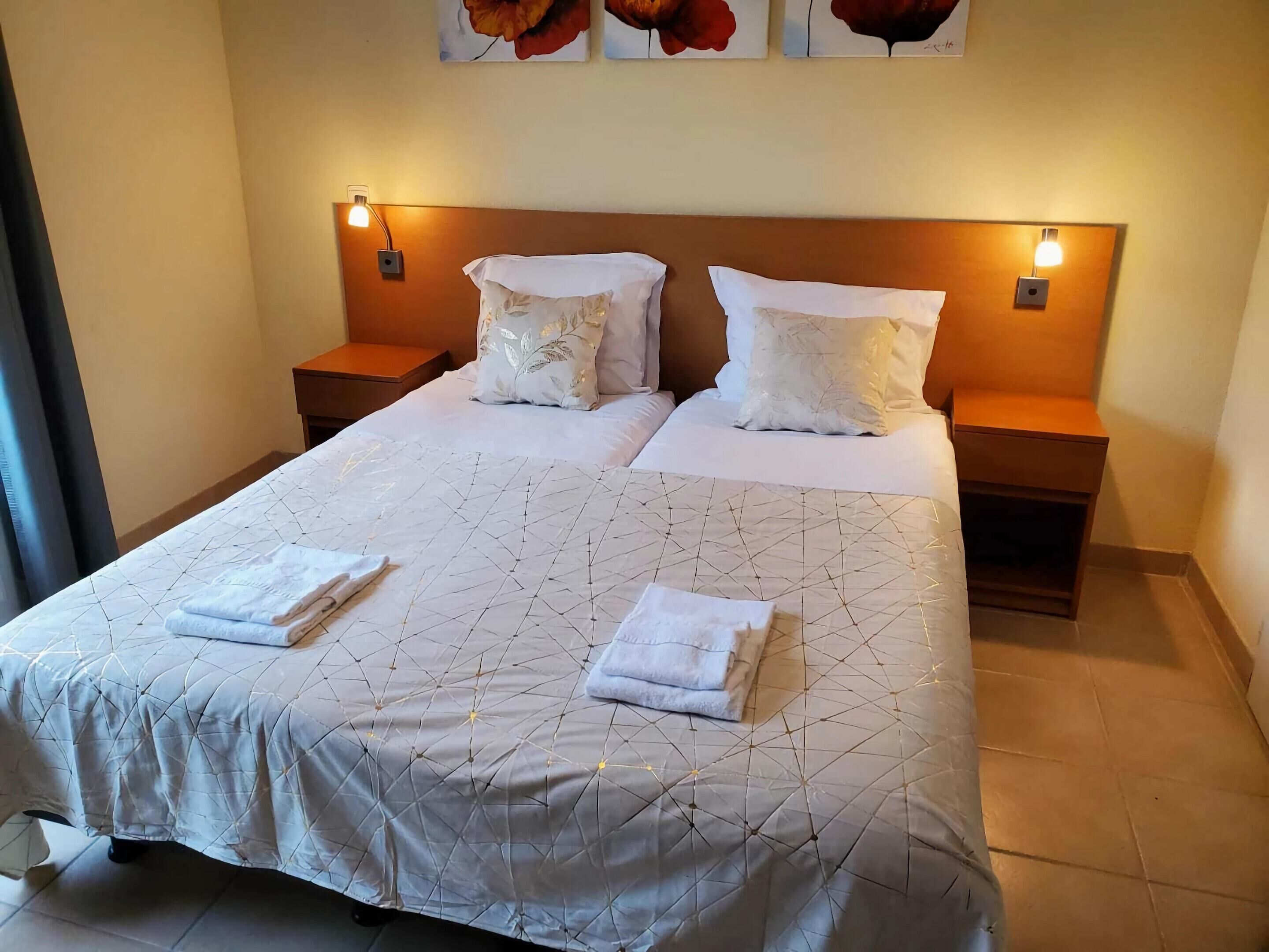 18 bedrooms, individually furnished, bed sheets