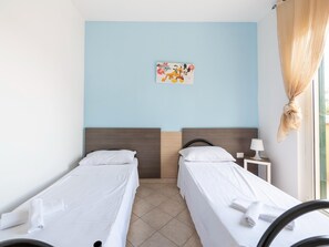 8 bedrooms, individually furnished, iron/ironing board, bed sheets