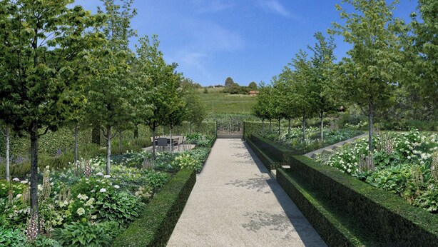 A garden pathway with neatly trimmed hedges and a variety of plants. - A Casa Guesthouse (Mombaruzzo)