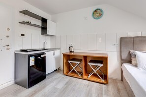 Fridge, coffee/tea maker, electric kettle, toaster