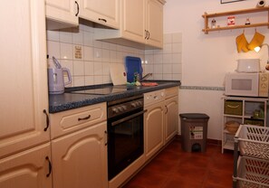 Fridge, coffee/tea maker, electric kettle, toaster