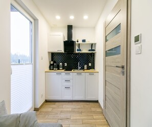 Maison Confort, 3 chambres | Cuisine privée | Réfrigérateur, lave-vaisselle, cafetière/bouilloire