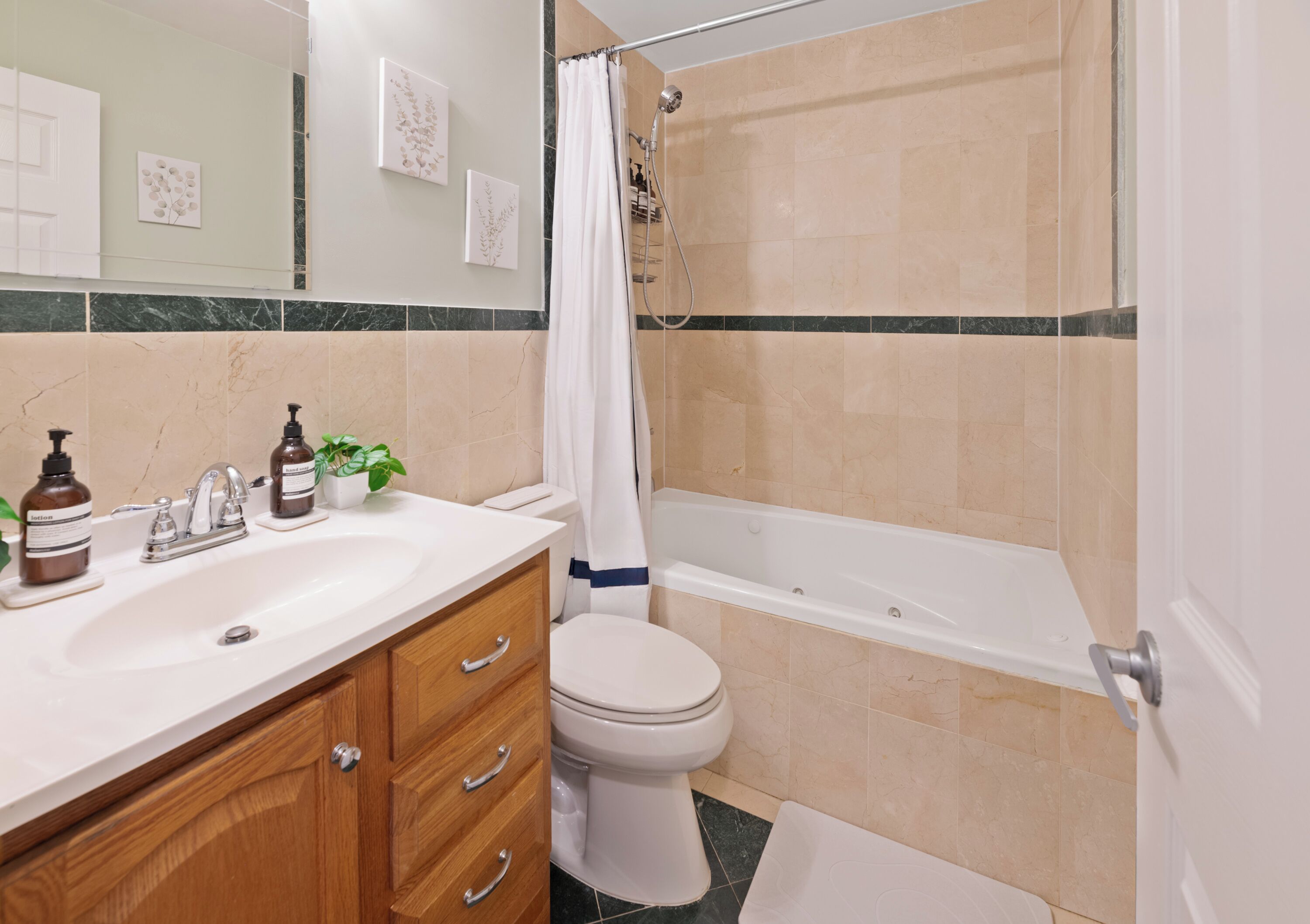 Jetted bath, hair dryer, towels, soap