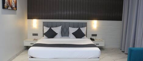 Executive kamer | Luxe beddengoed, bedden met traagschuimmatrassen, gratis wifi