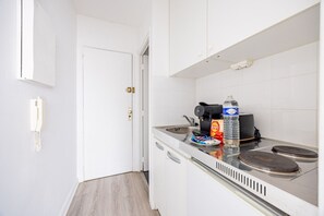 Microwave, stovetop, coffee/tea maker, toaster