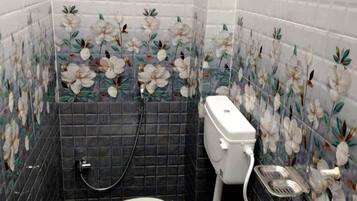 Shower, slippers, towels, soap