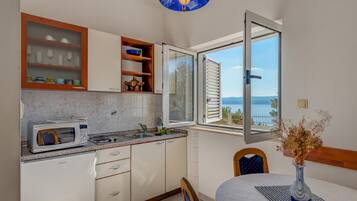 Apartment (One Bedroom Apartment 4) | Private kitchen | Fridge