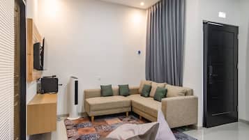 Villa estándar | Zona de estar | Una televisión LED