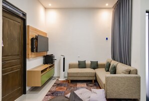 Villa – standard | Oppholdsområde | LED-TV